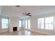 Bright living room with fireplace, hardwood floors, and ceiling fan at 127 Cantona Dr, Summerville, SC 29483