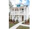 Two-story white house with front porch and landscaping at 123 Cantona Dr, Summerville, SC 29483