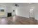 Living room with fireplace and hardwood floors, offering a bright and open feel at 135 Ashley Cove Way, Summerville, SC 29483