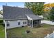 Rear view of house with screened porch and backyard at 3199 Sonja Way, Mount Pleasant, SC 29466