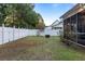 Private backyard with fire pit and white fence at 3199 Sonja Way, Mount Pleasant, SC 29466