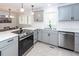 Modern kitchen with stainless steel appliances and white quartz countertops at 418 Wass Ln, Moncks Corner, SC 29461