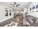 Open living room with hardwood floors, and a view into the kitchen at 154 Pecan Dr, Summerville, SC 29483