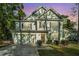 Two-story home with white siding, a gray door, and a two-car garage at 154 Pecan Dr, Summerville, SC 29483
