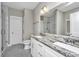 Modern bathroom with double vanity, granite countertop, and subway tile shower at 154 Pecan Dr, Summerville, SC 29483