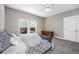 Serene bedroom with grey bedding and natural light at 154 Pecan Dr, Summerville, SC 29483