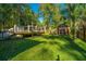 Spacious backyard with deck, shed, and lush green lawn at 154 Pecan Dr, Summerville, SC 29483
