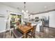 Kitchen dining area with wood table and access to backyard at 154 Pecan Dr, Summerville, SC 29483