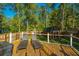 Deck with lounge chairs and view of backyard with shed at 154 Pecan Dr, Summerville, SC 29483