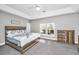 Spacious bedroom with wooden furniture and neutral decor at 154 Pecan Dr, Summerville, SC 29483