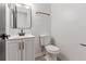 Modern bathroom with white vanity, black matte faucet, and updated toilet at 255 Pine Shadow Dr, Goose Creek, SC 29445