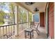 Inviting front porch with seating and neighborhood views at 8586 Refuge Point Cir, North Charleston, SC 29420