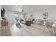 Spacious living room with comfortable seating and access to a balcony at 1331 Pelican Watch Villas, Seabrook Island, SC 29455