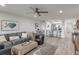 Bright living room with hardwood floors, open to kitchen at 1331 Pelican Watch Villas, Seabrook Island, SC 29455