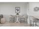 Small dining area with white table and two chairs at 1331 Pelican Watch Villas, Seabrook Island, SC 29455