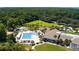 Resort-style pool with plenty of lounge chairs and surrounding landscaping at 1331 Pelican Watch Villas, Seabrook Island, SC 29455