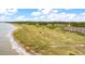 Beachfront property with a boardwalk leading to the ocean at 1331 Pelican Watch Villas, Seabrook Island, SC 29455
