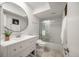 Clean bathroom with white vanity, walk-in shower and bathtub at 1331 Pelican Watch Villas, Seabrook Island, SC 29455