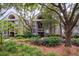 Two-story building with lush landscaping, offering a serene and private setting at 1331 Pelican Watch Villas, Seabrook Island, SC 29455