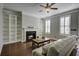 Living room with fireplace, built-in shelves, hardwood floors, and a comfy sofa at 752 Certificate Ct, Charleston, SC 29414