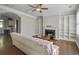 Living room with fireplace, built-in shelves, hardwood floors, and a comfy sofa at 752 Certificate Ct, Charleston, SC 29414