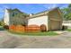 Single car detached garage with new wooden fence at 4966 Ballantine Drive, Summerville, SC 29485