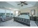 Main bedroom with king bed and ceiling fan at 4966 Ballantine Drive, Summerville, SC 29485