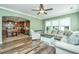 Spacious living room with hardwood floors, neutral decor, and open concept design at 4966 Ballantine Drive, Summerville, SC 29485