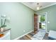 Inviting entryway with wood-look floors and a view to the front yard at 4966 Ballantine Drive, Summerville, SC 29485
