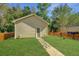 Nice storage shed in the backyard with a walkway at 4966 Ballantine Drive, Summerville, SC 29485