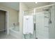 Bathroom with shower, bathtub, and tile floor at 4966 Ballantine Drive, Summerville, SC 29485