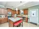 Modern kitchen with granite island, stainless steel appliances, and ample cabinetry at 4966 Ballantine Drive, Summerville, SC 29485