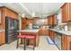 Spacious kitchen with granite island and stainless steel appliances at 4966 Ballantine Drive, Summerville, SC 29485