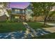 Two-story house with a lovely porch at dusk at 4966 Ballantine Drive, Summerville, SC 29485