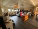 Spacious living area with vaulted ceiling and dark flooring at 204 Charles St, Saint George, SC 29477