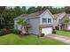 Two-story home with stone accents and a two car garage at 3758 Tupelo Church Ln, Mount Pleasant, SC 29429