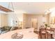 Kitchen with breakfast bar and view into dining area at 60 Fenwick Hall Allee # 933, Johns Island, SC 29455