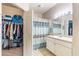 Bathroom with shower, vanity, and walk-in closet at 60 Fenwick Hall Allee # 933, Johns Island, SC 29455