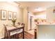 Small dining area with kitchen and hardwood floors at 60 Fenwick Hall Allee # 933, Johns Island, SC 29455