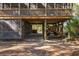 Elevated home with golf cart garage and screened porch at 362 Pelican Flight Dr, Dewees Island, SC 29451