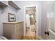 Small bathroom with shower and built in dresser at 362 Pelican Flight Dr, Dewees Island, SC 29451
