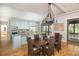 Spacious kitchen with light blue cabinets, granite countertops, and stainless steel appliances at 362 Pelican Flight Dr, Dewees Island, SC 29451
