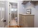 Small bathroom with shower and built in dresser at 362 Pelican Flight Dr, Dewees Island, SC 29451