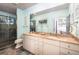 Bathroom boasts double vanity, a large shower, and stone tile floors at 362 Pelican Flight Dr, Dewees Island, SC 29451