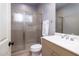 Small bathroom with shower, toilet and vanity at 362 Pelican Flight Dr, Dewees Island, SC 29451