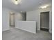 Spacious upper hallway with neutral paint and carpet at 415 Snowy Plover Ln, Summerville, SC 29486