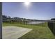 Private backyard with pond view and fenced area at 415 Snowy Plover Ln, Summerville, SC 29486