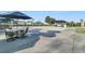 Community patio with tables, chairs, and umbrellas at 510 Eastern Isle Ave, Summerville, SC 29486
