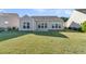 Rear view of house showing patio and lawn at 510 Eastern Isle Ave, Summerville, SC 29486
