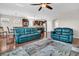 Living room with teal couches and area rug at 510 Eastern Isle Ave, Summerville, SC 29486